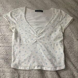 Brandy Melville Cream and Blue Floral Tee
